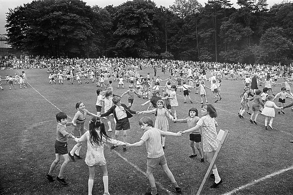 Children country dancing in Teesside. 1973