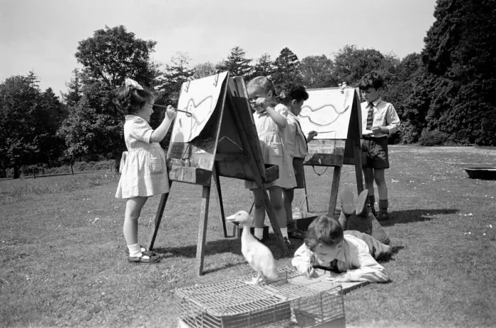 Framed Print : Children at Crarleigh L. C. C. Residential Nursery School look after their pet ducklings