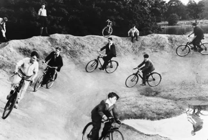 Framed Print : Children cycling around a crater on a bomb site during Second World War. Circa 1944 Framed Print : Children cycling around a crater on a bomb site during Second World War. Circa 1944