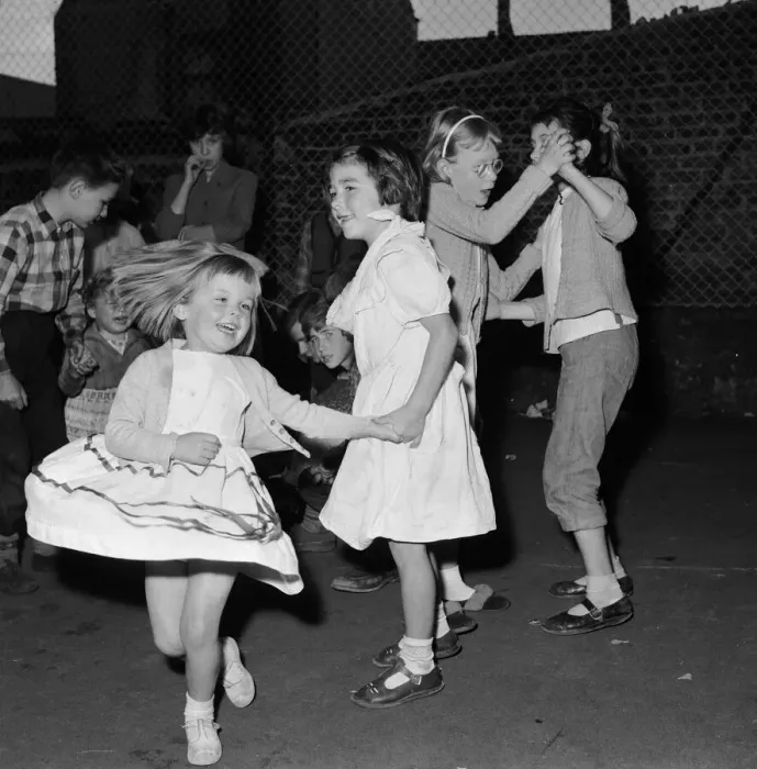 Framed Print : Children dancing to rock n roll music at Mandeville block of flats off Chapel Market