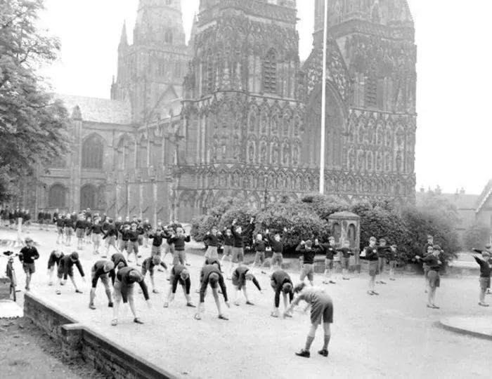: Children doing their daily PT in the grounds of Lichfield Cathedral. September 1959 : Children doing their daily PT in the grounds of Lichfield Cathedral. September 1959