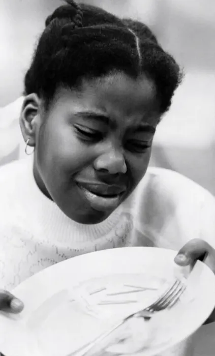 Framed Print : Children: Eating and Drinking: Fish finger tester Erica Loley. October 1980