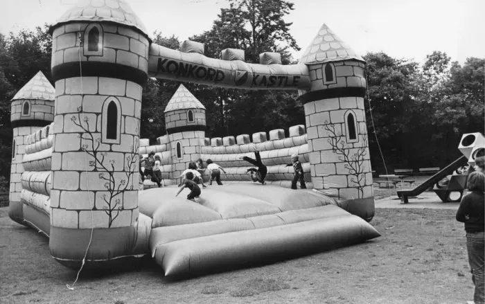 Framed Print : Children enjoy a bouncy castle Framed Print : Children enjoy a bouncy castle