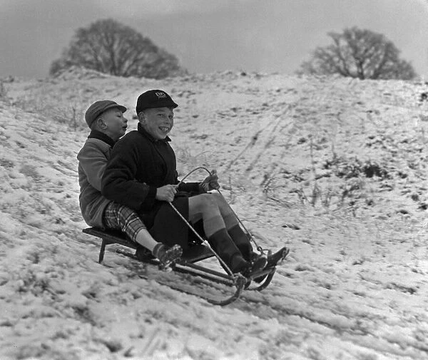 Children enjoying the snow in a Bristol park 31st December 1961