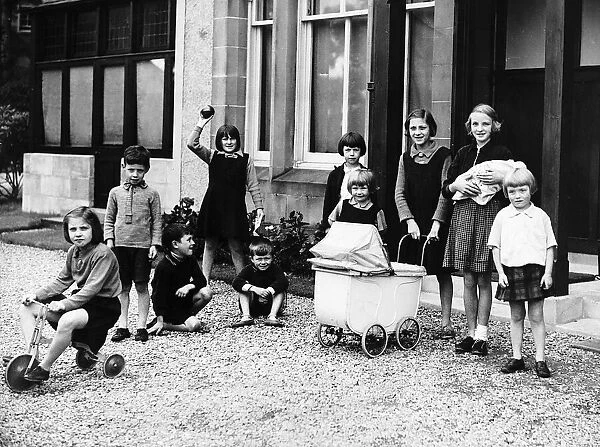 Children evacuated from Glasgow during World War Two play in a garden at Duneira