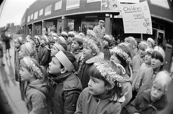Children from Hemlington Hall Infant school carol singing in Hemlington, Middlesbrough