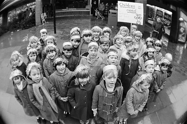 Children from Hemlington Hall Infant school carol singing in Hemlington, Middlesbrough