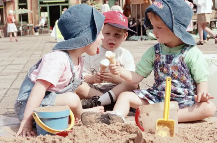 Framed Print : Children from Kids & Co. Nursery spend the morning playing with the sand in Framed Print : Children from Kids & Co. Nursery spend the morning playing with the sand in