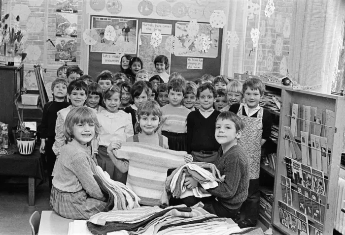 Framed Print : Children at Lindley CofE Infants school examine some of the handiwork of teachers Framed Print : Children at Lindley CofE Infants school examine some of the handiwork of teachers