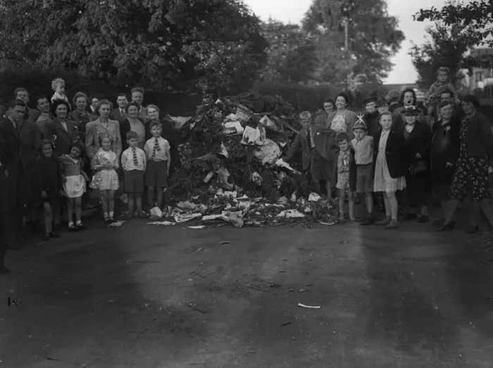 Framed Print : Children, Mums and Dad celebrate VJ Day by building bonfires on the streets of Birmingham Framed Print : Children, Mums and Dad celebrate VJ Day by building bonfires on the streets of Birmingham