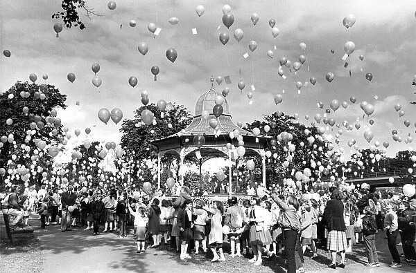 Children from Newbiggin Hall Estate in the West End of Newcastle set balloons flying