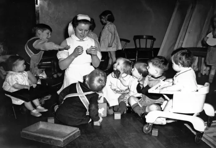 Framed Print : Children in nursery while their mothers work during World War II. Circa 1941 Framed Print : Children in nursery while their mothers work during World War II. Circa 1941