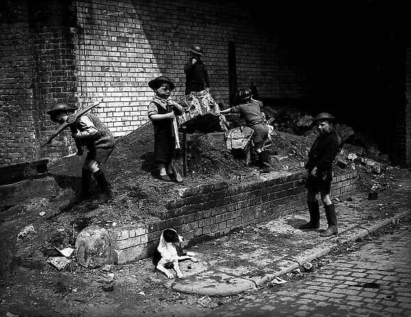 Children play as air raid wardens during WW2