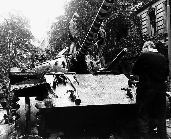 Children play on Russian tank in Prague during Russian Invasion in August 1968
