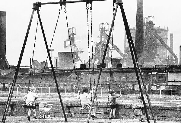 Children at play in the shadow of the steelworks at Grangetown, 1970