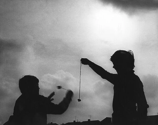 Children playing conkers, Cambridge, 1976