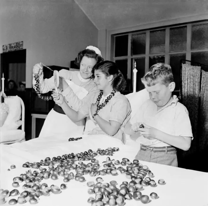Framed Print : Children playing conkers at Royal National Orthopaedic Hospital at Stanmore
