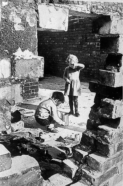 Children playing in a derelict building in 1970 Local Caption friendshipimages