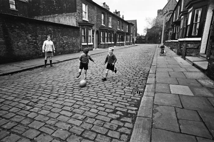 Framed Print : Children playing football in Archie Street, Manchester. Archie Street was the inspiration Framed Print : Children playing football in Archie Street, Manchester. Archie Street was the inspiration