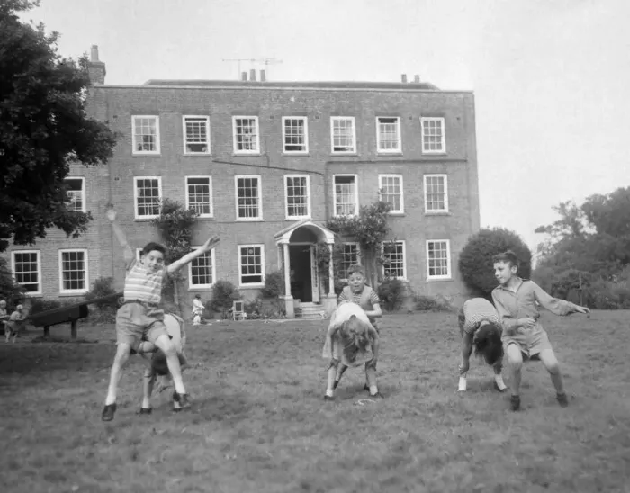 Framed Print : Children playing Leapfrog in the gardens at Beech Hill House convalescent home Framed Print : Children playing Leapfrog in the gardens at Beech Hill House convalescent home