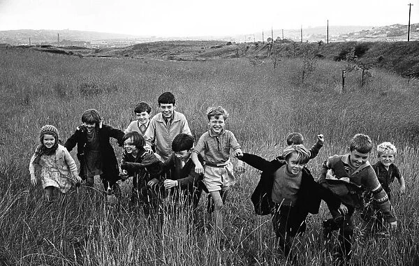 Children playing in the Lower Swansea Valley Project, Wales