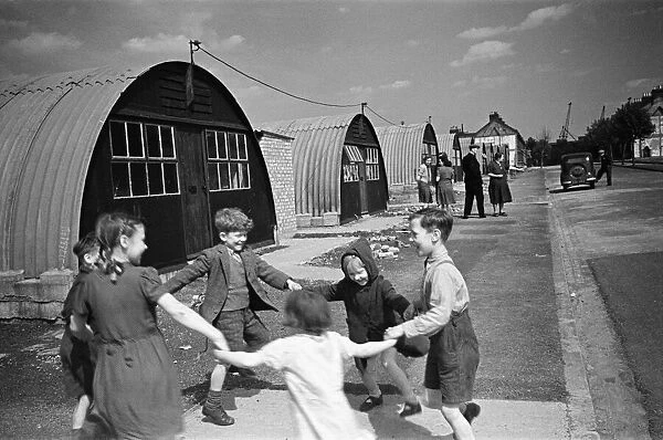 Children playing, outside Dockland Houses, Isle of Dogs