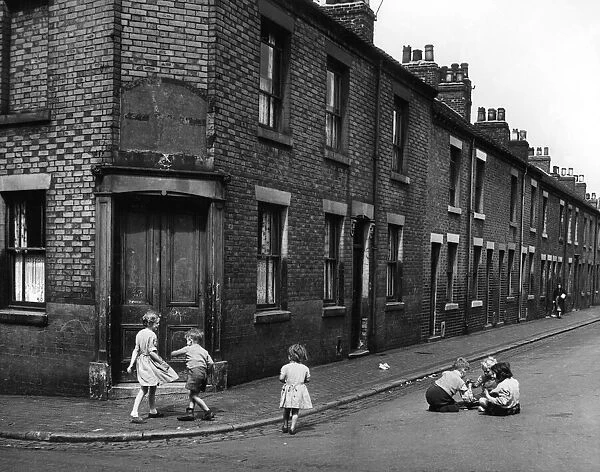 Children playing on the roadside at the corner of Loftus Street in Hanley