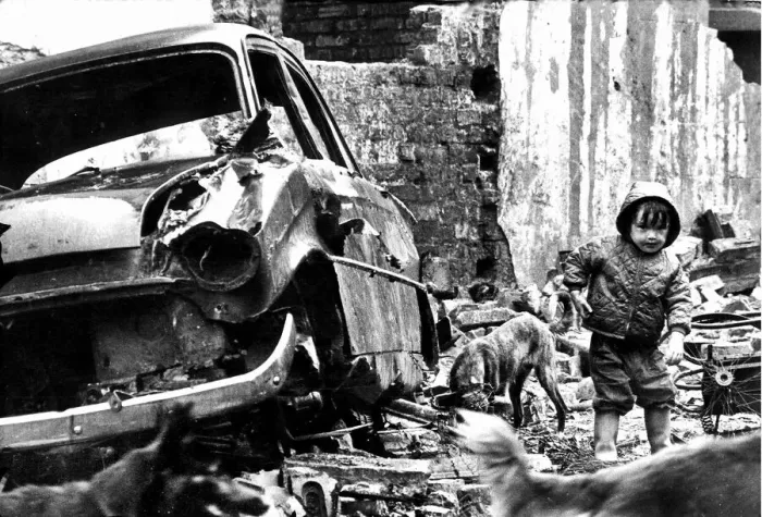 Framed Print : Children playing in the Scotswood area of Newcastle. An abandoned car Framed Print : Children playing in the Scotswood area of Newcastle. An abandoned car