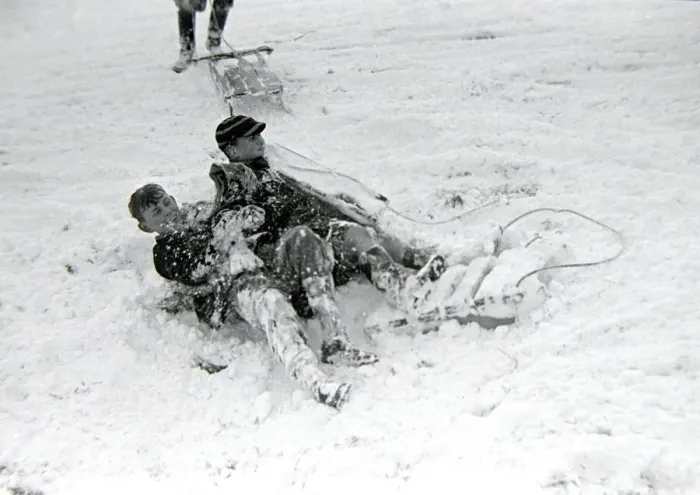 Framed Print : Children playing in the snow after a heavy fall at Hampstead Heath January 1945 Framed Print : Children playing in the snow after a heavy fall at Hampstead Heath January 1945