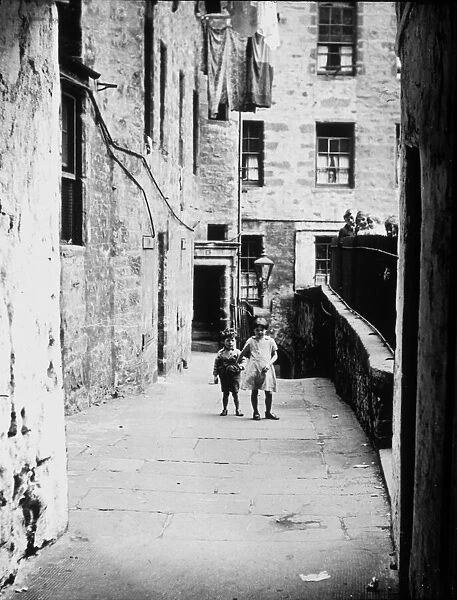 Children playing in the street close to Holy Trinity Church, Coventry city centre