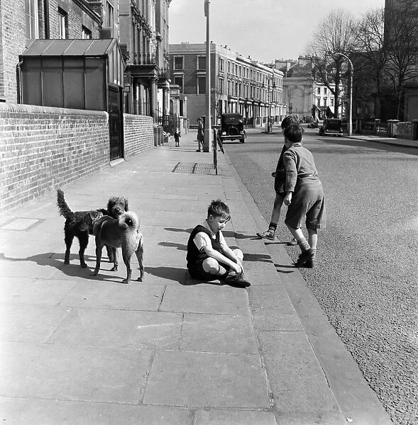 Children playing in the street, Formosa Street, London. 25th April 1955