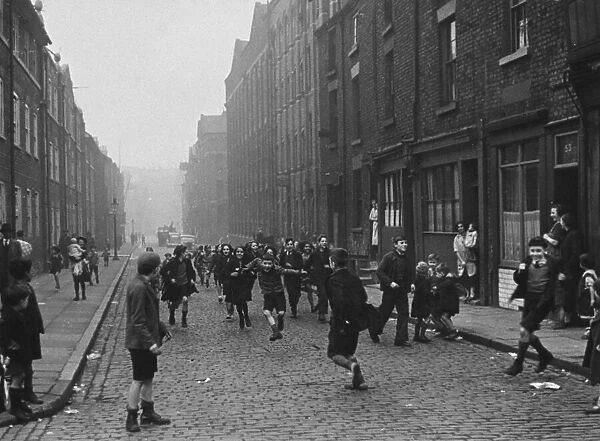 Children playing in the streets of Liverpools Chinatown 20th November 1933 Liverpool