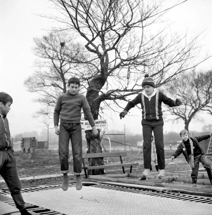 Framed Print : Children playing on trampolines in the adventure playground at Basildon, Town centre Framed Print : Children playing on trampolines in the adventure playground at Basildon, Town centre