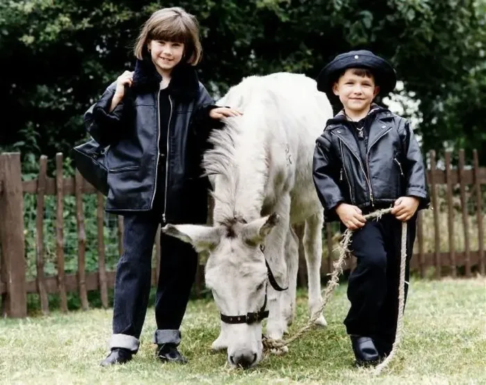 : Two children Samantha and Aaron modelling clothes for Mirror Fashion Article : Two children Samantha and Aaron modelling clothes for Mirror Fashion Article