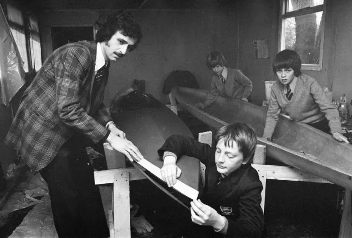 Framed Print : Children at Sarah Metcalfe School build a canoe in Wood shop class, Middlesbrough Framed Print : Children at Sarah Metcalfe School build a canoe in Wood shop class, Middlesbrough