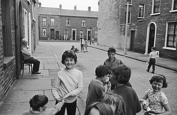 Children seen here playing in the back streets of Belfast. Circa 1966