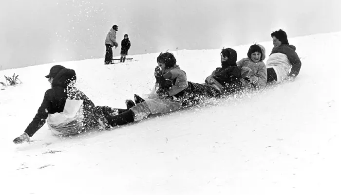 Framed Print : Children sledging, Ormesby Bank, Middlesbrough, North Yorkshire. 12th February 1978