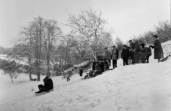 Children sledging in Stoke Park, Bristol 31st December 1961