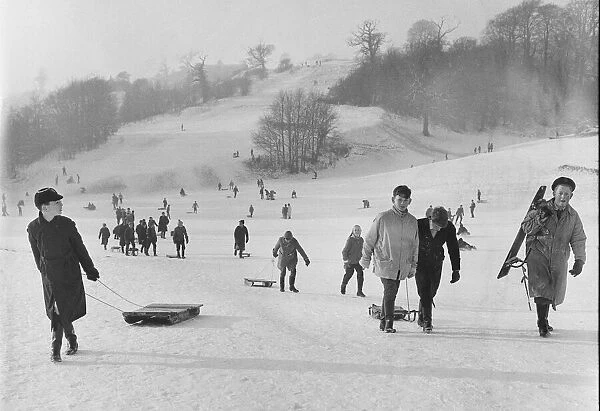 Children take the slopes of a Bristol park after a fresh fall of snow. 2nd January 1962