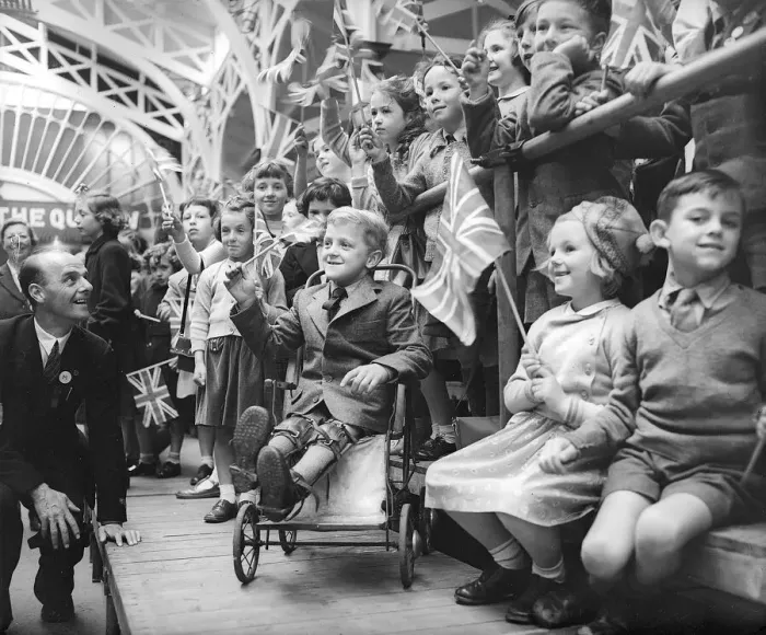 Framed Print : Children with union jack flags smile at Queen Elizabeth on tour of Barnstable Framed Print : Children with union jack flags smile at Queen Elizabeth on tour of Barnstable