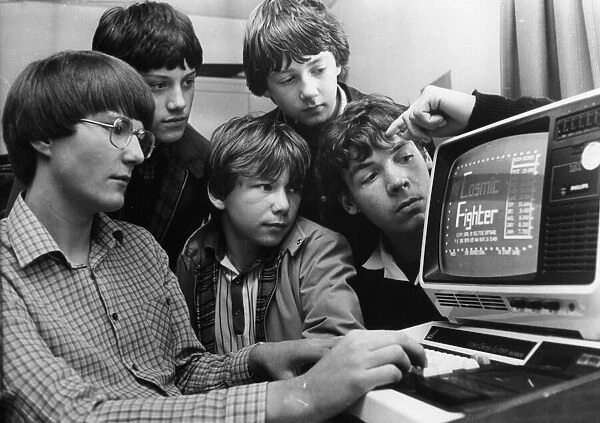 Children using computers. Computer crazy schoolboys Andy Stoneman, Luke Youll, John Shaw