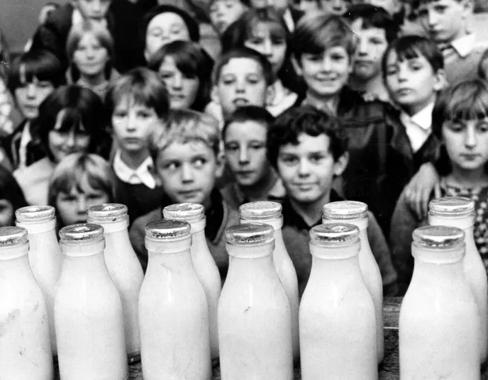 Framed Print : Children waiting for their daily bottle of milk. Circa 1970 Framed Print : Children waiting for their daily bottle of milk. Circa 1970