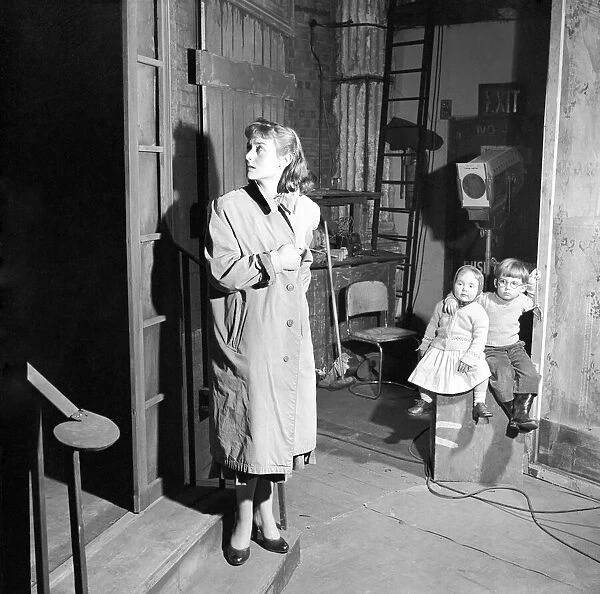 Children watch mother rehearsal of The Dance Dress play: Helena Hughes, (Mrs