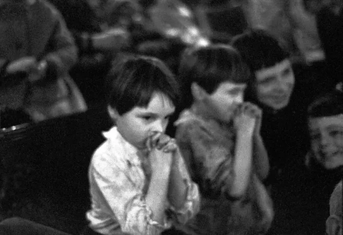 Framed Print : Children watching the pantomime Treasure Island at the Theatre Royal