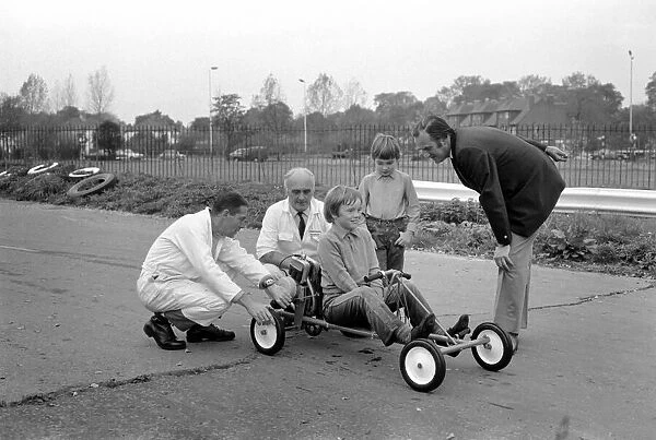 ChildrenIs Go-kart: Skid Pan officials, adjust the Go Kart prior to Robert Spicer driving