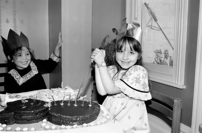 Framed Print : Childrens birthday party: The birthday girl cuts the cake. March 1981 PM 81-01186b Framed Print : Childrens birthday party: The birthday girl cuts the cake. March 1981 PM 81-01186b