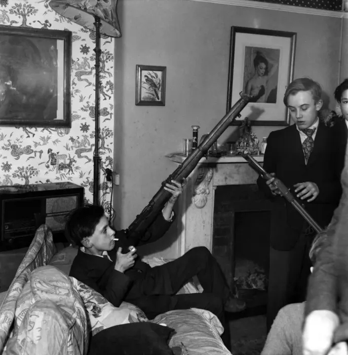 Framed Print : Childrens Party given by M. R. Copping. Teenage boys playing with shotguns Framed Print : Childrens Party given by M. R. Copping. Teenage boys playing with shotguns