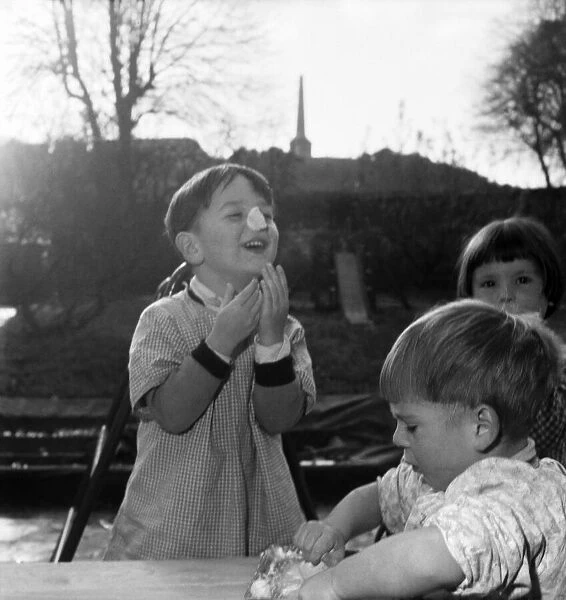 Childrens playing with putty. November 1953 D6729-002