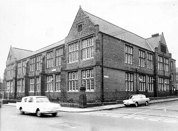Chillingham Road School, Newcastle in the 1970 s. Two Ford Anglia cars