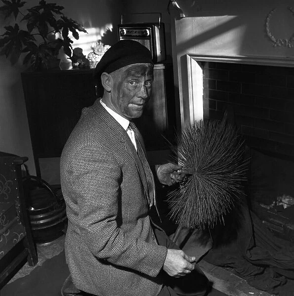 Chimney sweep (Ronald Neal) seen here at work. 1967 A1328-004